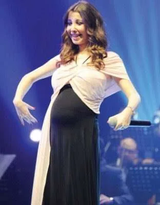 نانسي عجرم حامل الثالث وتتحدث حول تحقيق امنية ميلا وإيلا 1 Dj3IeCBXcAA 3n1